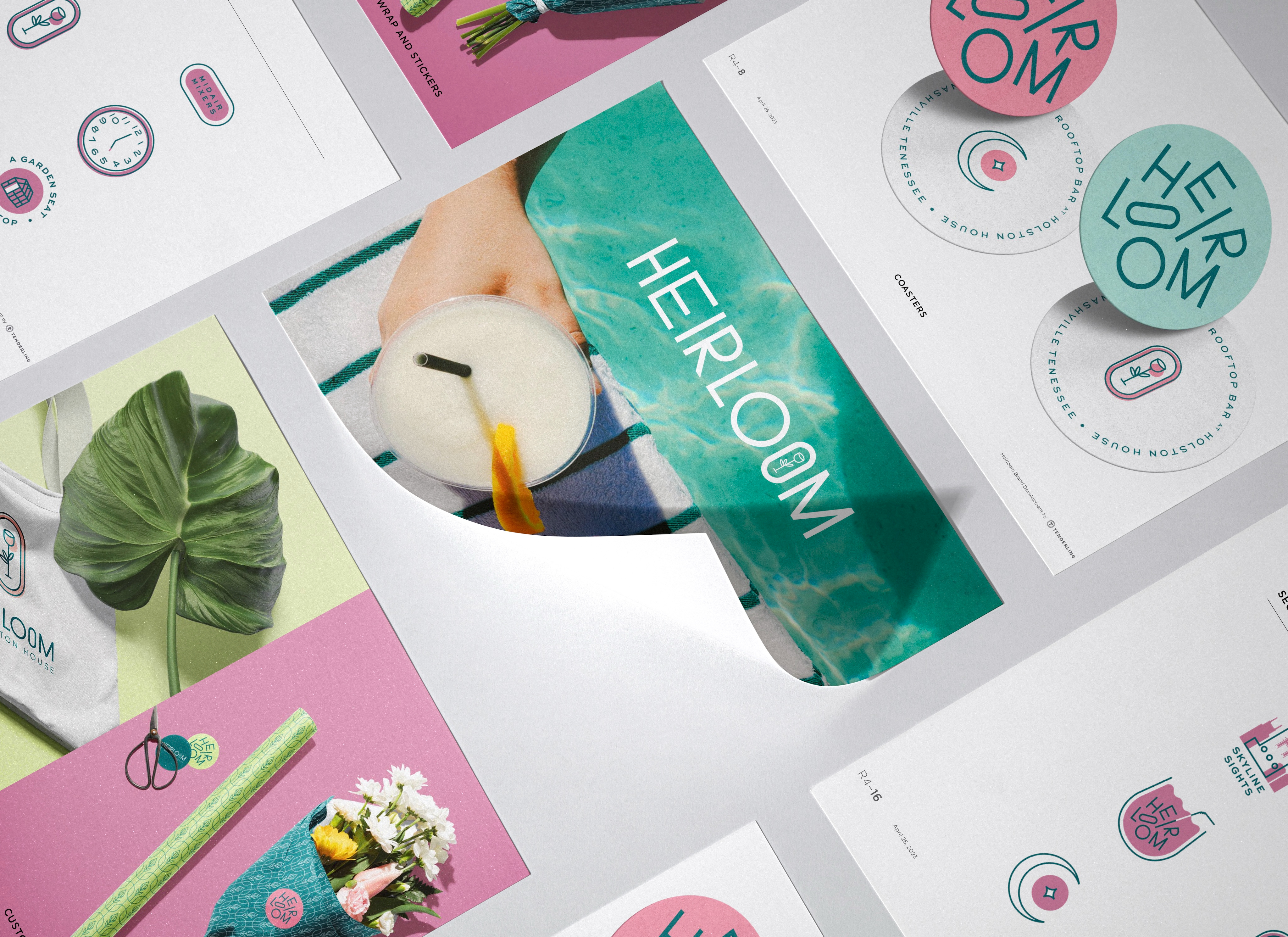 Assorted branded stationery and promotional materials for "HEIRLOOM" are arranged on a white surface, featuring colorful graphics, logos, modern designs, and turnkey solutions for every promotional need.